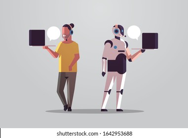 robotic operator with man consultant using laptop chat bubble client support robot vs human standing together call center artificial intelligence technology concept flat full length horizontal vector