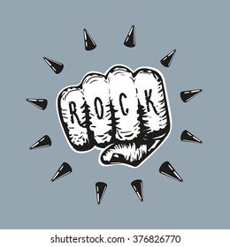 Rock fist. Human hand with a tattoo front view. Illustration for rock concert posters and banners. Grunge style isolated sign. 