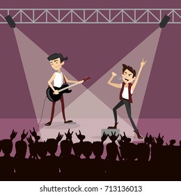 Rock group concert. Funny happy band and audience. Singer and guitarist.