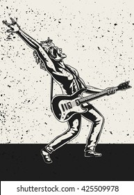 Rock Guitarist playing the electric guitar on stage