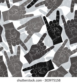 Rock hands seamless pattern, rock, metal, rock and roll music style vector background for wallpapers, textile or other designs.