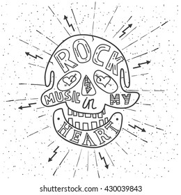 Rock music in my heart. Hand drawn lettering design with skull. Typography concept for t-shirt design or web site. Vector illustration.