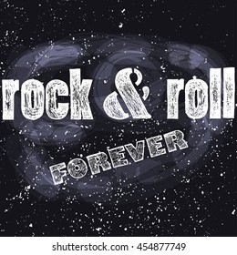 Rock n Roll forever grunge lettering, written in chalk on a dark background