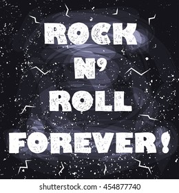 Rock n roll forever, lettering on black, written in chalk on a dark background