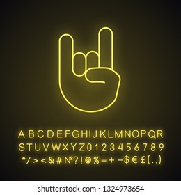 Rock on gesture neon light icon. Horns sign emoji. Devil fingers. Heavy metal hand gesture. Glowing sign with alphabet, numbers and symbols. Vector isolated illustration