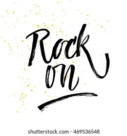 Rock on. Vector hand written brush pen calligraphy phrase or quote. Cute isolated letters on an abstract background.