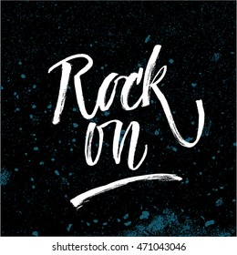 Rock on. Vector hand written brush pen calligraphy phrase or quote. Cute isolated letters on an abstract background.