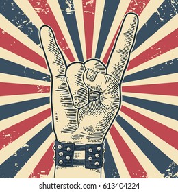 Rock and Roll hand sign. Hand drawn in a graphic style. Vintage vector engraving illustration.