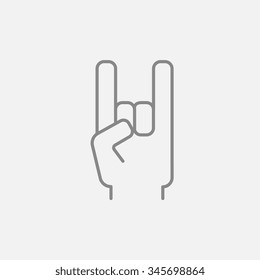 Rock and roll hand sign line icon for web, mobile and infographics. Vector dark grey icon isolated on light grey background.