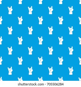 Rock and Roll hand sign pattern repeat seamless in blue color for any design. Vector geometric illustration