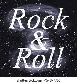 Rock and roll, lettering on black, written in chalk on a dark background