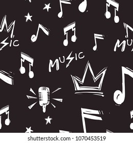 Rock and roll seamless pattern with crown, note signs, microphone, stars. Hard rock doodle illustration. Cartoon rock star iconic backdrop for music band, concert, party. Isolated on black background.