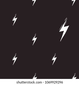 Rock and roll seamless pattern with electricity lightnings. Vector hard rock doodle illustration. Cartoon rock star iconic backdrop for music band, concert, party. Isolated on black background.