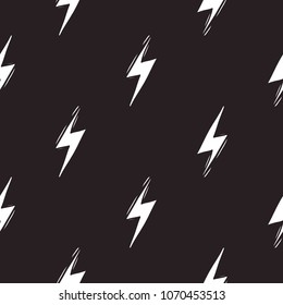 Rock and roll seamless pattern with electricity lightnings. Vector hard rock doodle illustration. Cartoon rock star iconic backdrop for music band, concert, party. Isolated on black background.