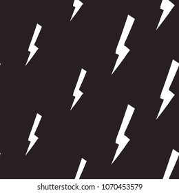 Rock and roll seamless pattern with flash lightnings. Vector hard rock doodle illustration. Cartoon rock star iconic backdrop for music band, concert, party. Isolated on black background.