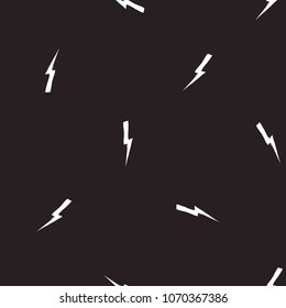Rock and roll seamless pattern with lightnings. Vector hard rock doodle illustration. Cartoon rock star iconic backdrop for music band, concert, party. Isolated on black background.