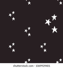 Rock and roll seamless pattern with little stars. Vector hard rock doodle illustration. Cartoon rock star iconic backdrop for music band, concert, party. Isolated on black background.