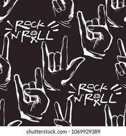 Rock and roll seamless pattern with rock'n'roll text sign, peace and rock gestures. Vector hard rock doodle illustration. Cartoon rock backdrop for music band, concert, party with black background.