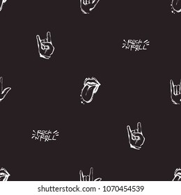 Rock and roll seamless pattern with tongue and rock'n'roll gestures. Vector hard rock doodle illustration. Rock star iconic backdrop for music band, concert, party. Isolated on black background.