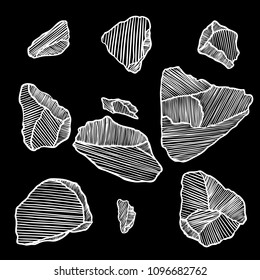 Rock stone set. Black and white stones and rocks in hand drawn hatching, wood carve style. Set of different boulders. Vector.