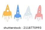 Rocket drawing in hand drawn style. A set of multi-colored rockets. Isolated on a white background. Vector illustration