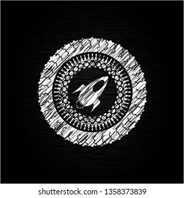 rocket icon with chalkboard texture