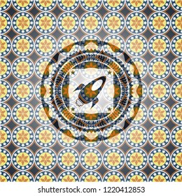 rocket icon inside arabic badge. Arabesque decoration.