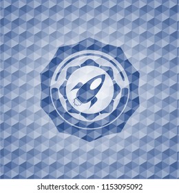rocket icon inside blue badge with geometric pattern.
