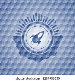 rocket icon inside blue emblem or badge with abstract geometric pattern background.