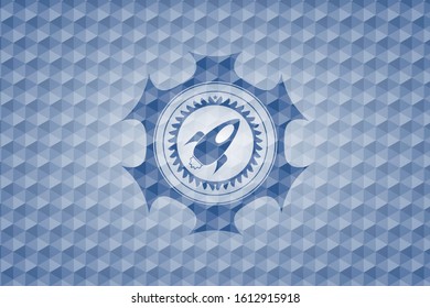 rocket icon inside blue emblem or badge with abstract geometric polygonal pattern background.