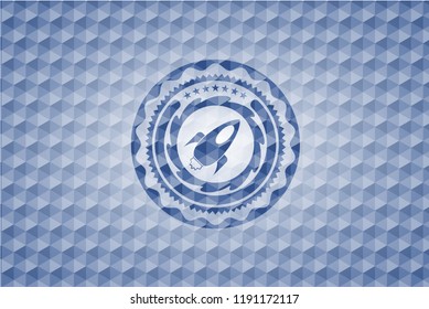 rocket icon inside blue polygonal emblem.