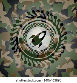 rocket icon inside camouflaged emblem