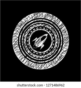 rocket icon inside chalk emblem