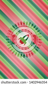rocket icon inside christmas badge.