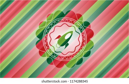 rocket icon inside christmas colors badge.