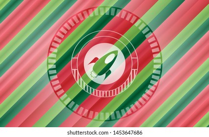 rocket icon inside christmas colors emblem.