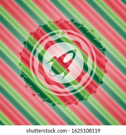 rocket icon inside christmas colors style emblem.