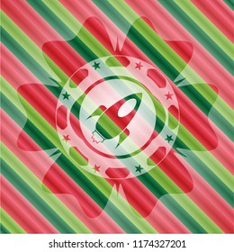 rocket icon inside christmas emblem background.