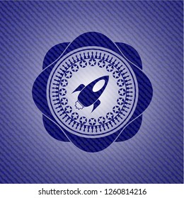 rocket icon inside emblem with jean high quality background