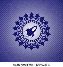 rocket icon inside emblem with jean high quality background