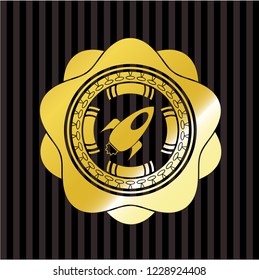 rocket icon inside gold badge or emblem