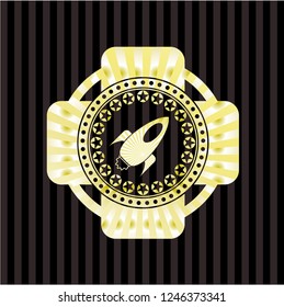 rocket icon inside gold badge or emblem