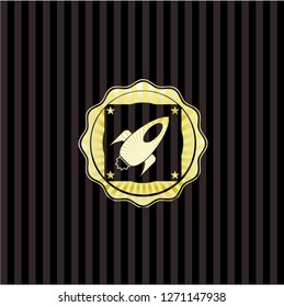rocket icon inside gold emblem or badge