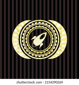 rocket icon inside gold emblem or badge. 