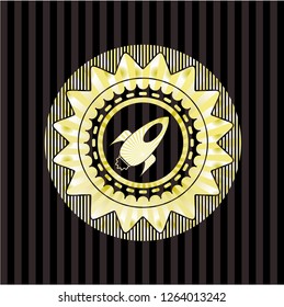 rocket icon inside gold shiny badge