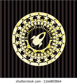 rocket icon inside golden emblem or badge