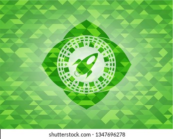 rocket icon inside green emblem with mosaic ecological style background