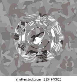 icono del cohete dentro del emblema de camo gris. 