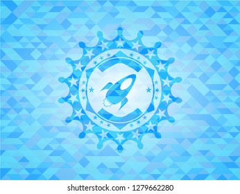 rocket icon inside light blue emblem with mosaic background