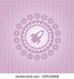 rocket icon inside pink icon or emblem